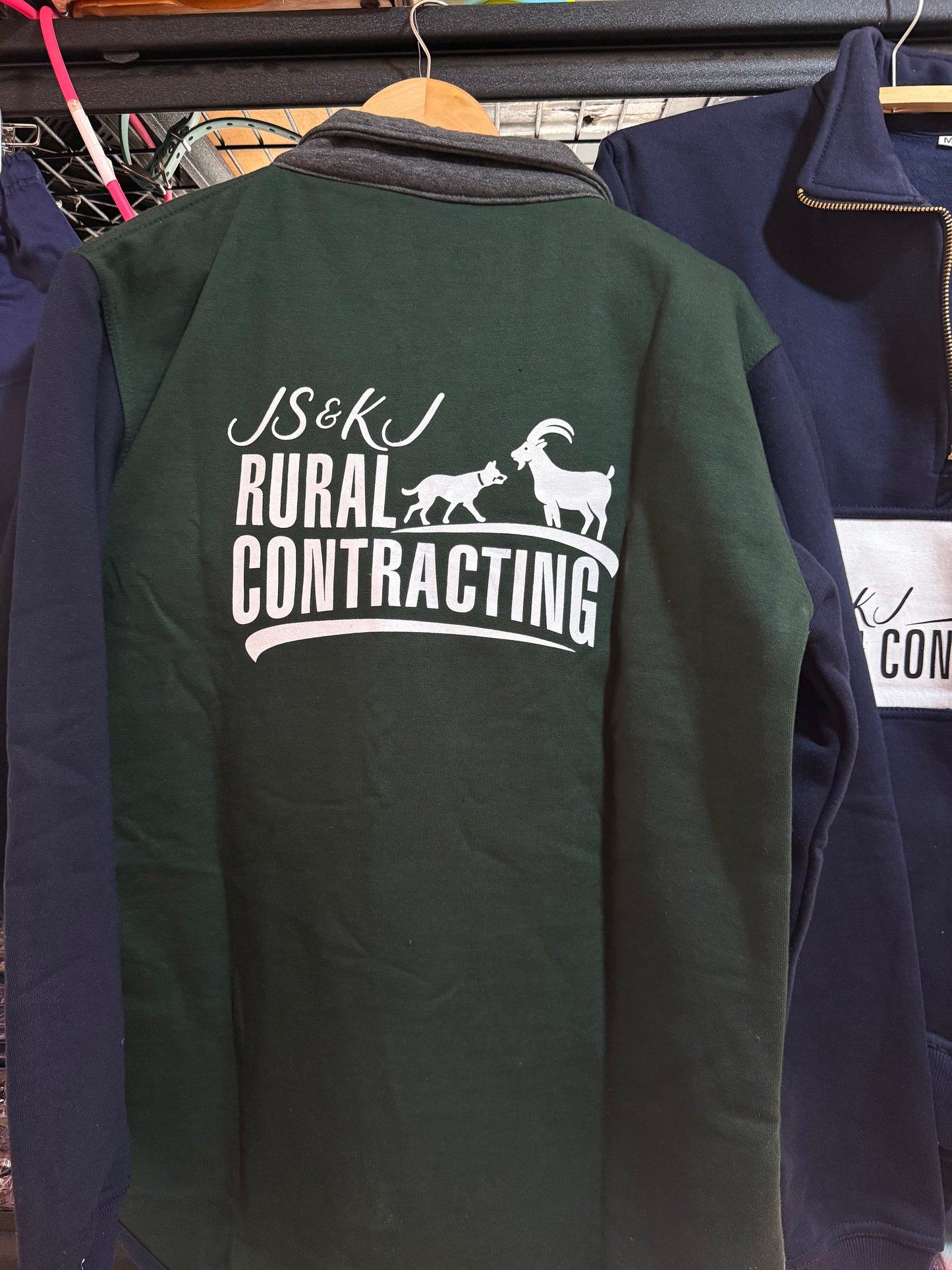 Green long tailed jumper